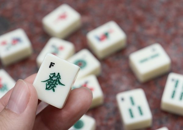 Mahjong: A Game of Skill, Strategy, and Luck